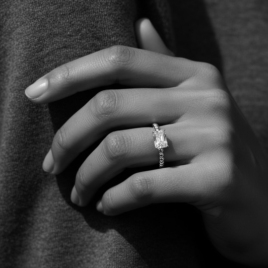 1 carat emerald cut beaded band solitaire ring in silver