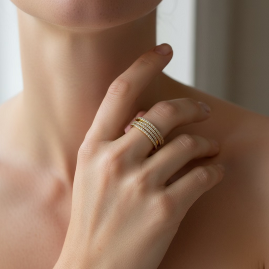 4 slim pave eternity bands stacked in gold