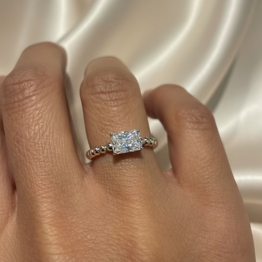 Emerald cut solitaire promise ring with beaded band in Silver