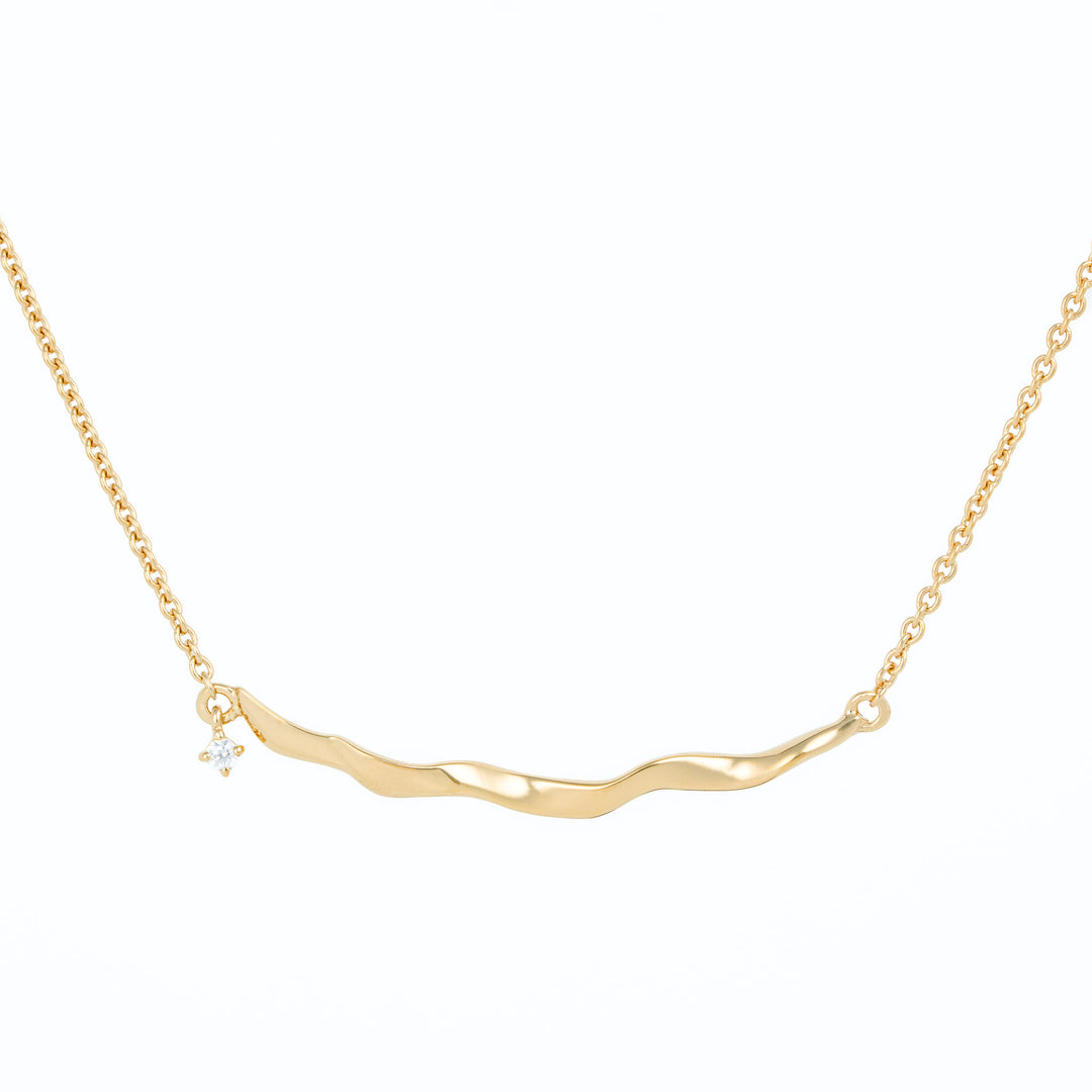 Gold bar necklace with dangle stone