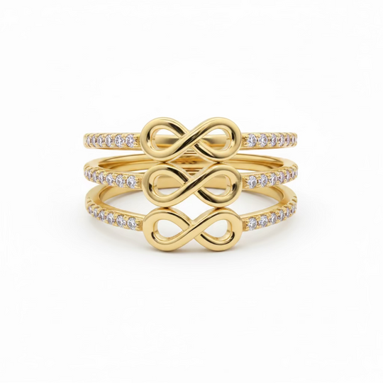 Infinity symbol rings with shoulder stones in gold 