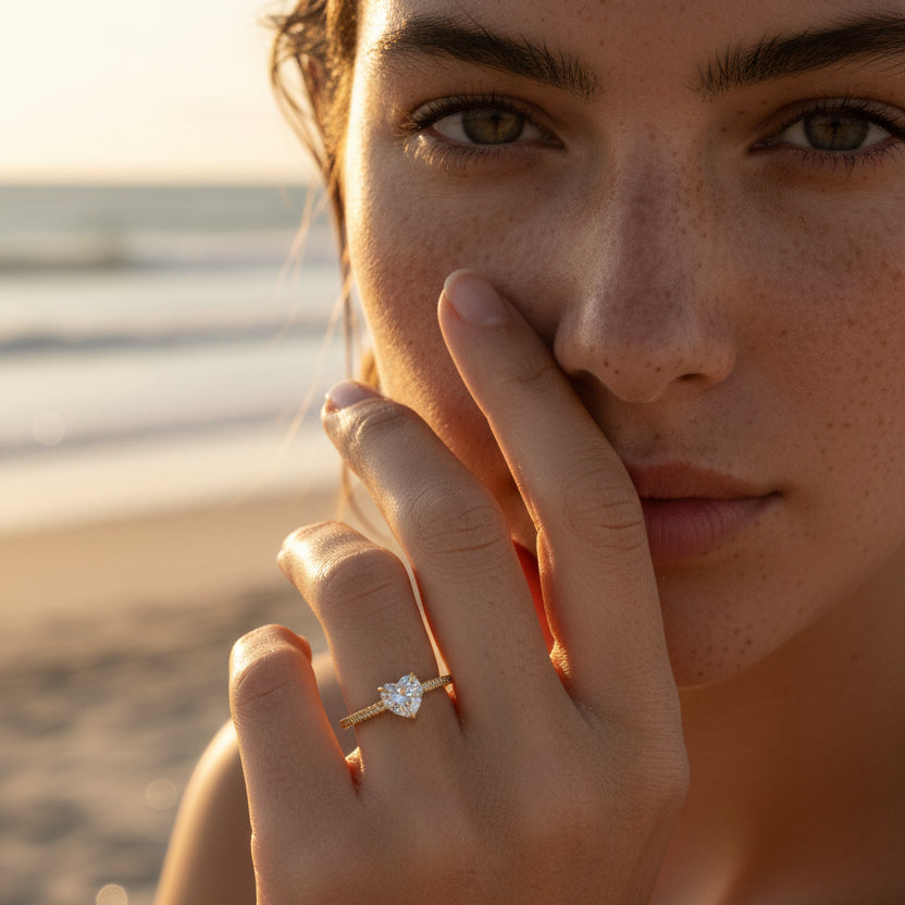 0.8carat heart solitaire ring in gold with shoulder stones