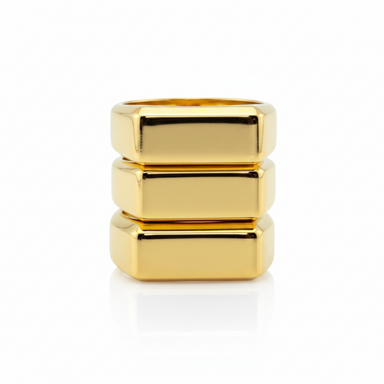 elongated rectangle signet rings stack in gold