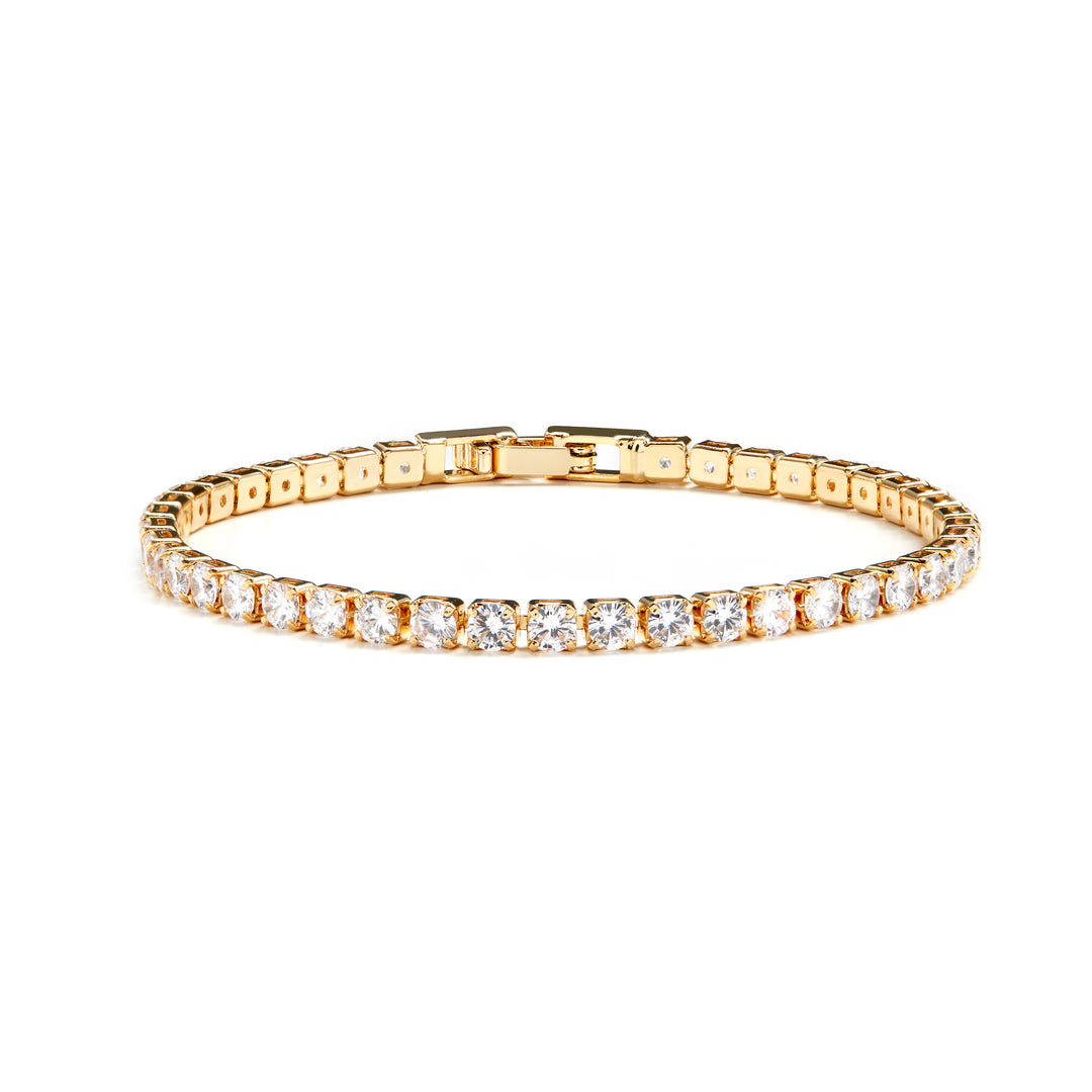 gold sparking tennis bracelet with white stones and secure seamless lock timeless