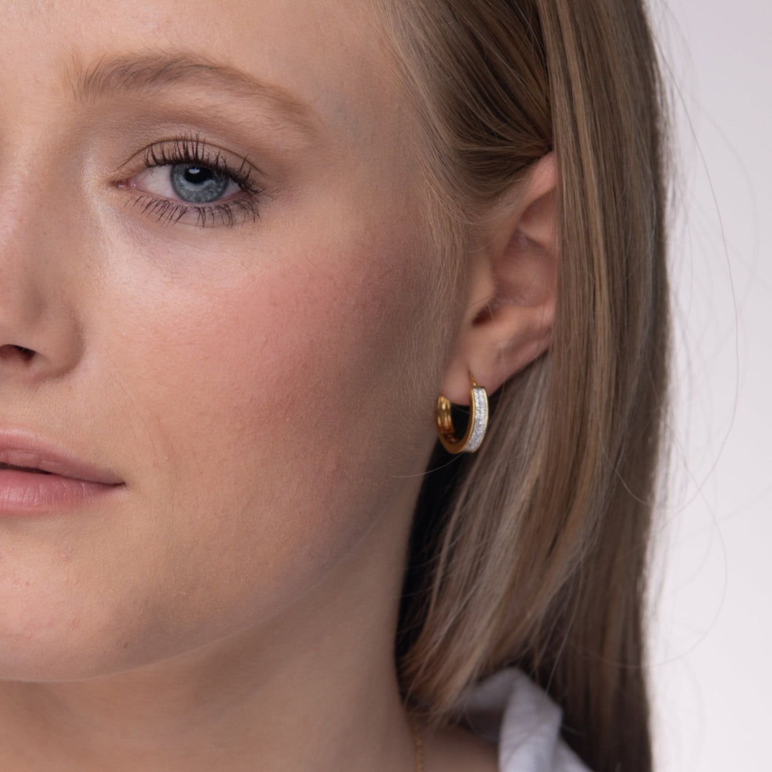 wide gold hoop medium size with 2 rows of stones and half plain for her NAIMA online