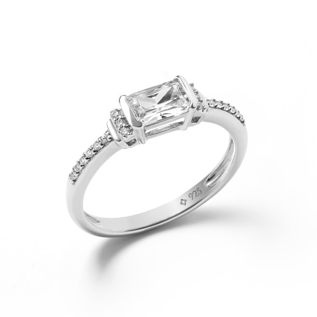 white gold look half bezel emerald cut solitaire promise ring with shoulder details for women by NAIMA Jewellery