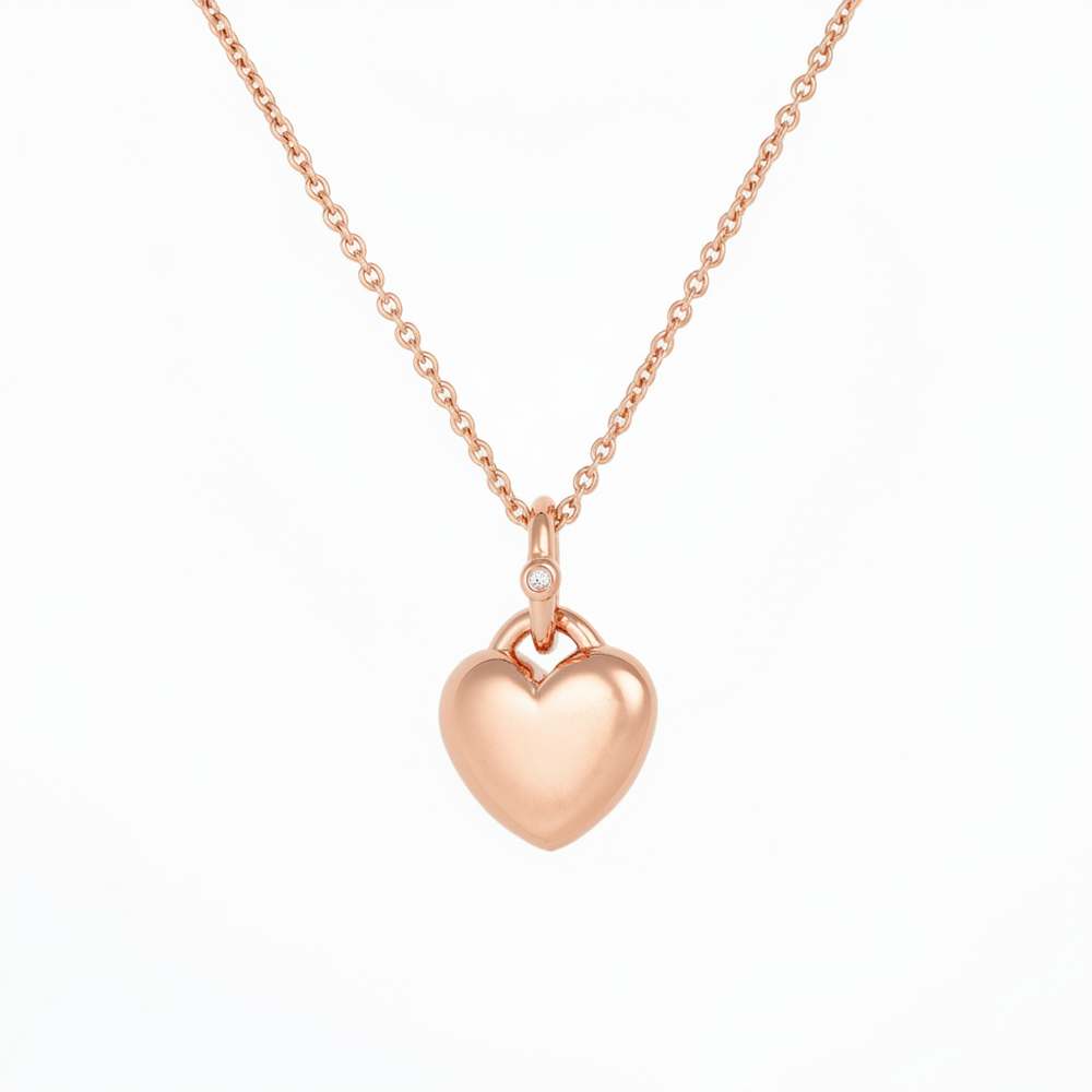 Puffy heart pendant with a stone in rose gold 