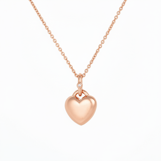 Puffy heart pendant with a stone in rose gold 