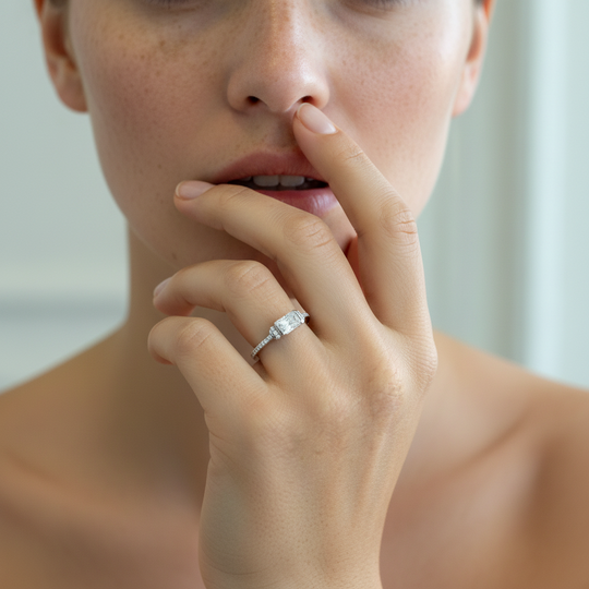 Solitaire Emerald cut promise ring in Silver with shoulder stones