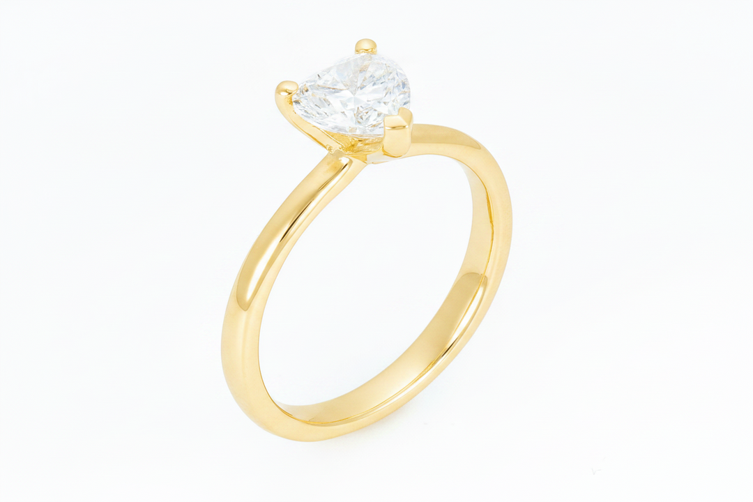 Gold heart solitaire ring 