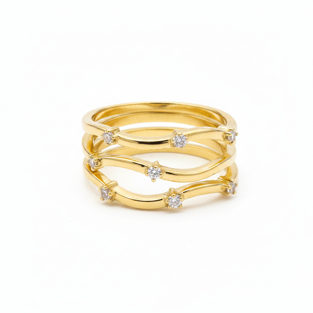 Wave rings with 3 stones in gold 