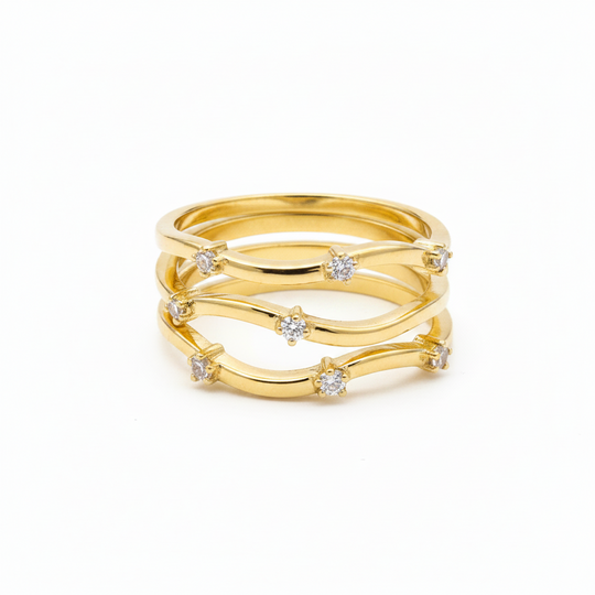 Wave rings with 3 stones in gold 