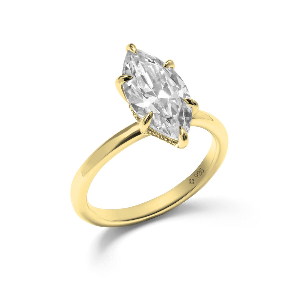 large three carat marquise solitaire promise ring plain shank and hidden detail setting by NAIMA best Jewellery for women in 18K Yellow gold vermeil