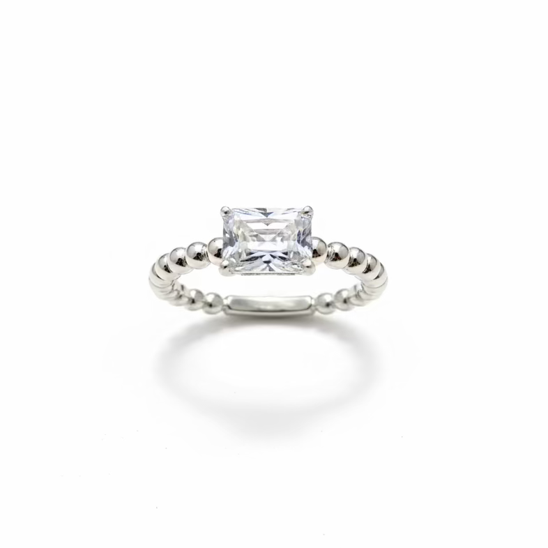 one carat emerald cut solitaire ring with beaded shank in Silver
